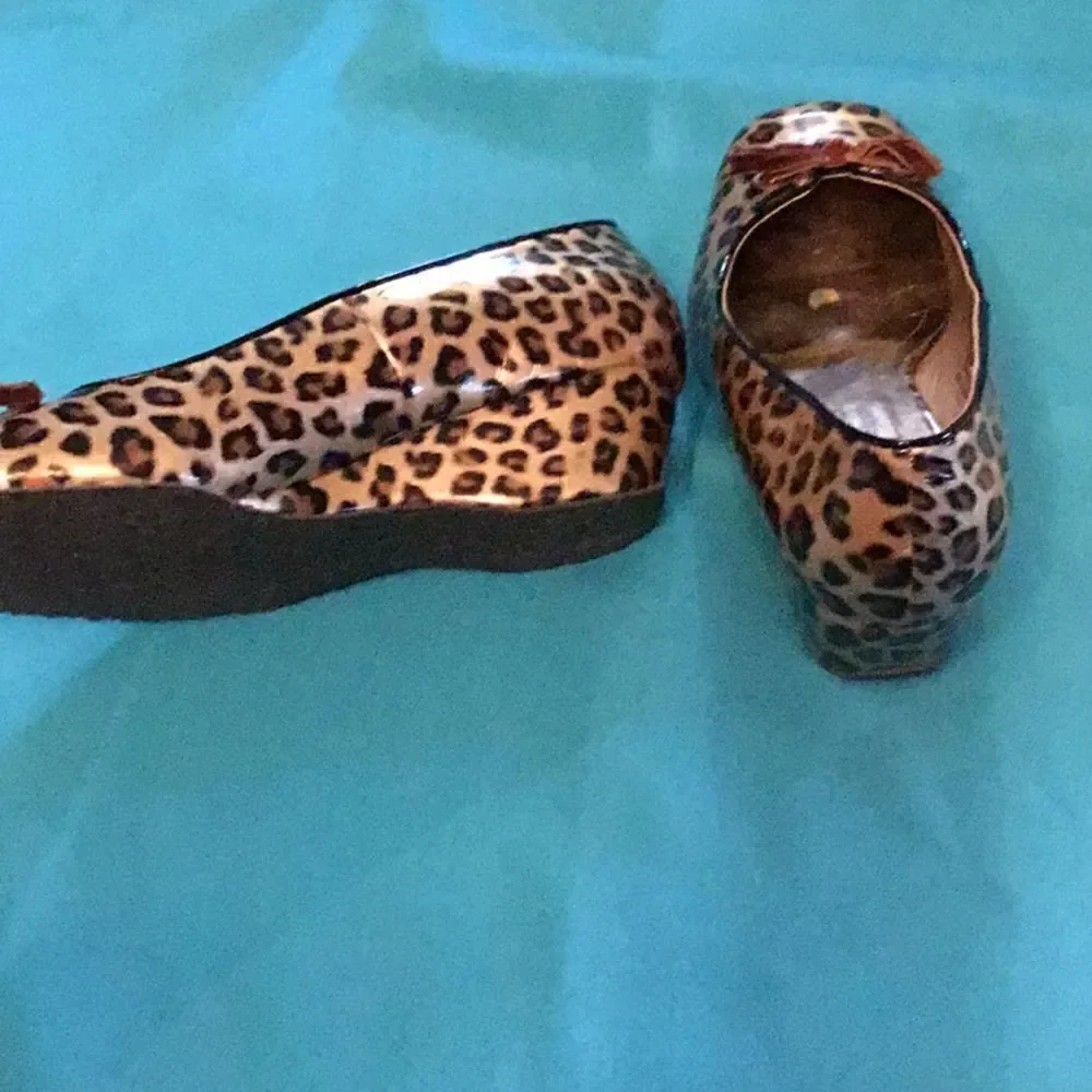 Animal print wedges in size 6 1/2 by COCONUTS